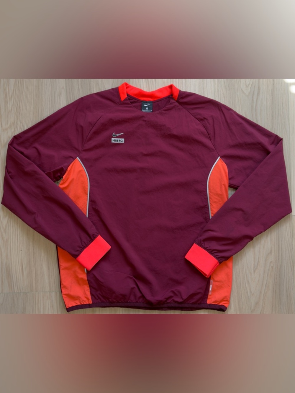 Nike Men's Burgundy Training Sweatshirt with Bright Orange Accents